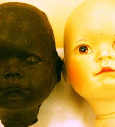 Chocolate zombie head beside its silicon reference